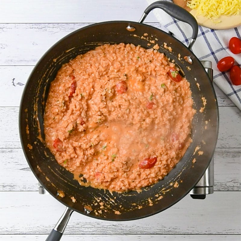 Keto Vegetarian Casserole Ingredients simmering in a frying pan.