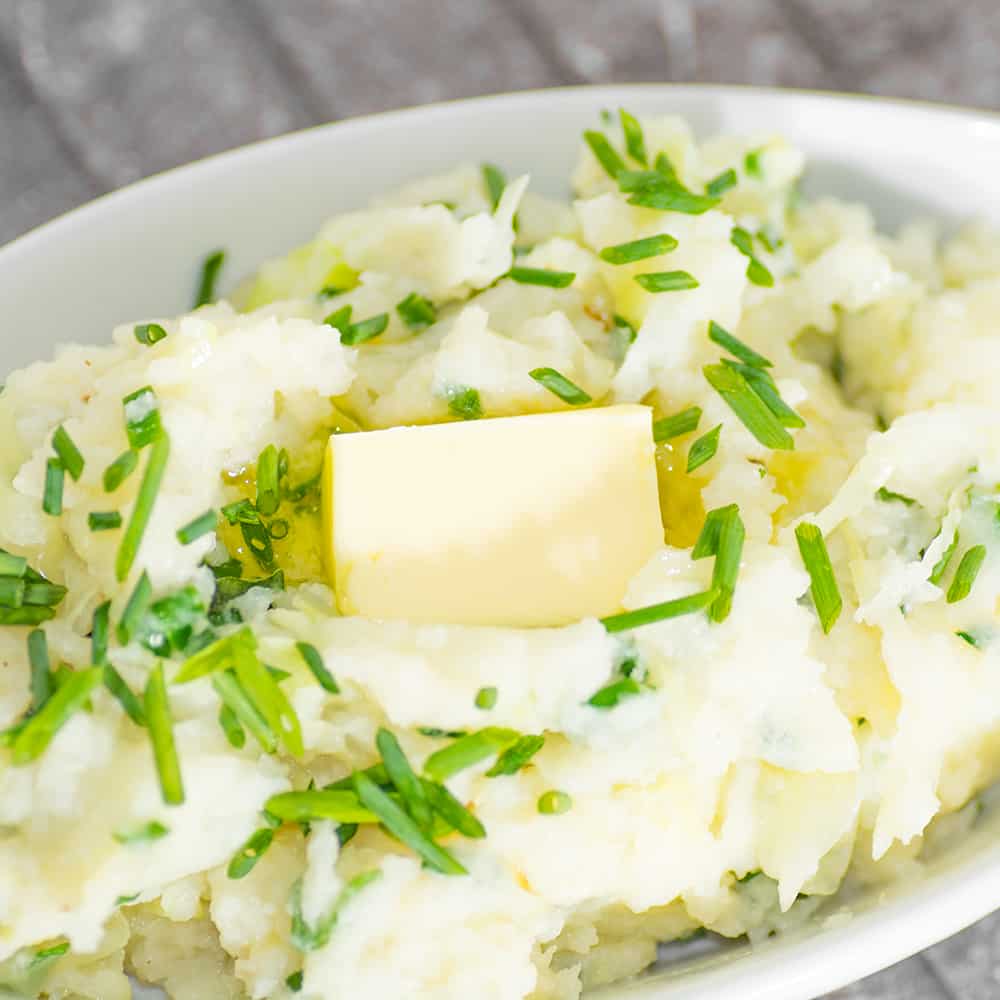 How to make Keto Cauliflower Colcannon. This easy side dish recipe is inspired by the Irish. It's a healthy, gluten free vegetable dish that everyone loves.