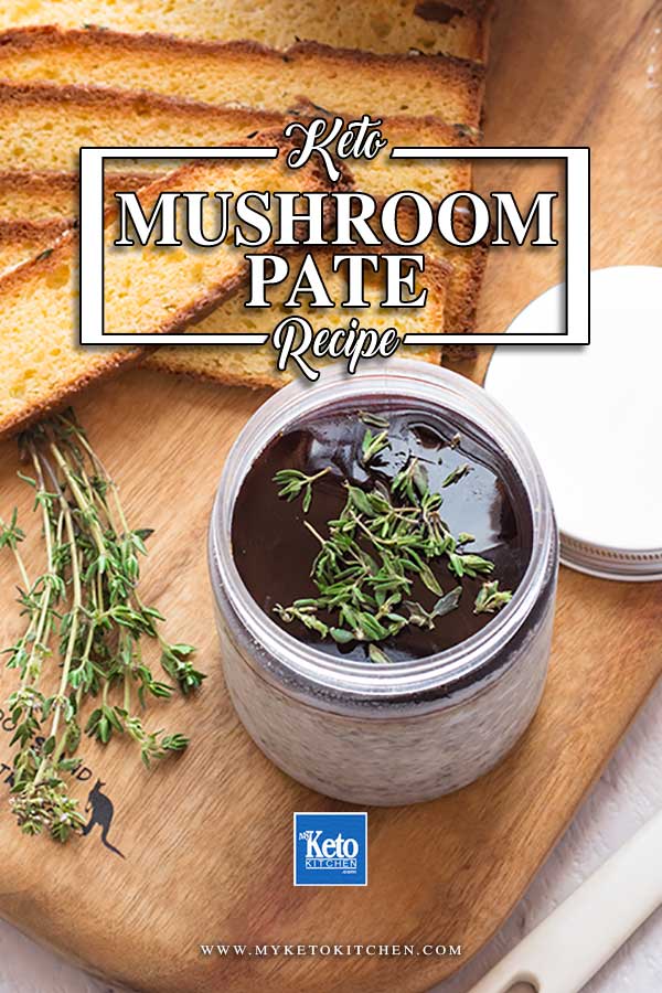 Keto Mushroom Pate on a wooden board with crispy low carb bread