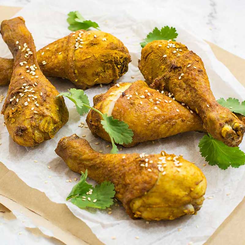 keto chicken drumsticks being served