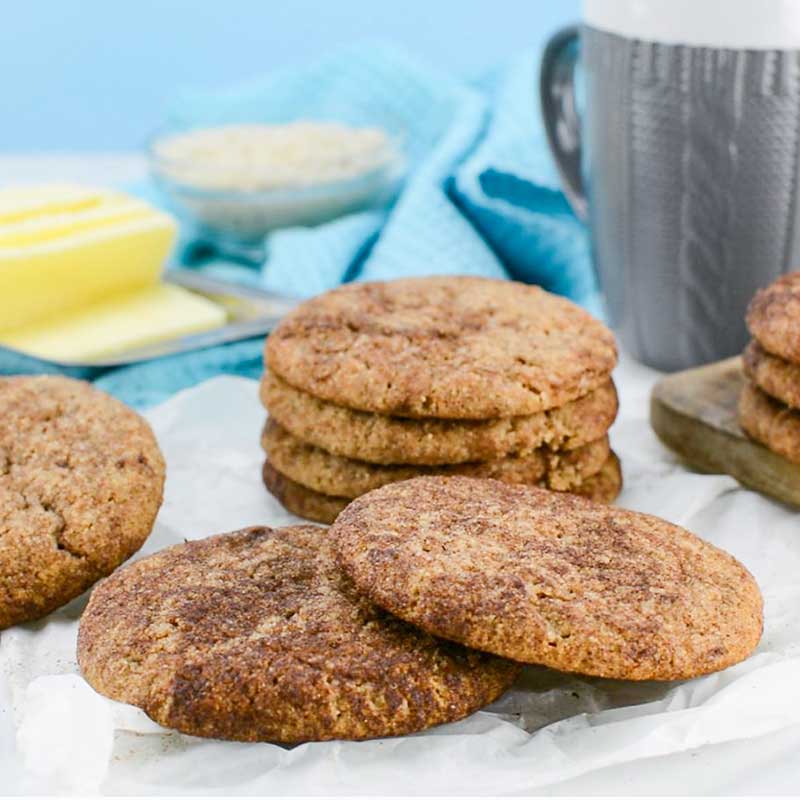 Keto Snickerdoodle Cookies stacked in a pile