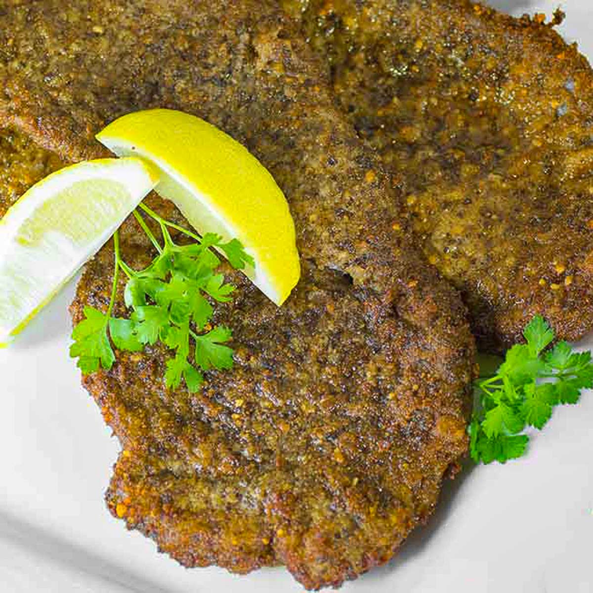 Keto beef schnitzel with delicious low carb breading.