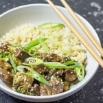 Keto Beef and Broccoli in a bowl with cauliflower rice