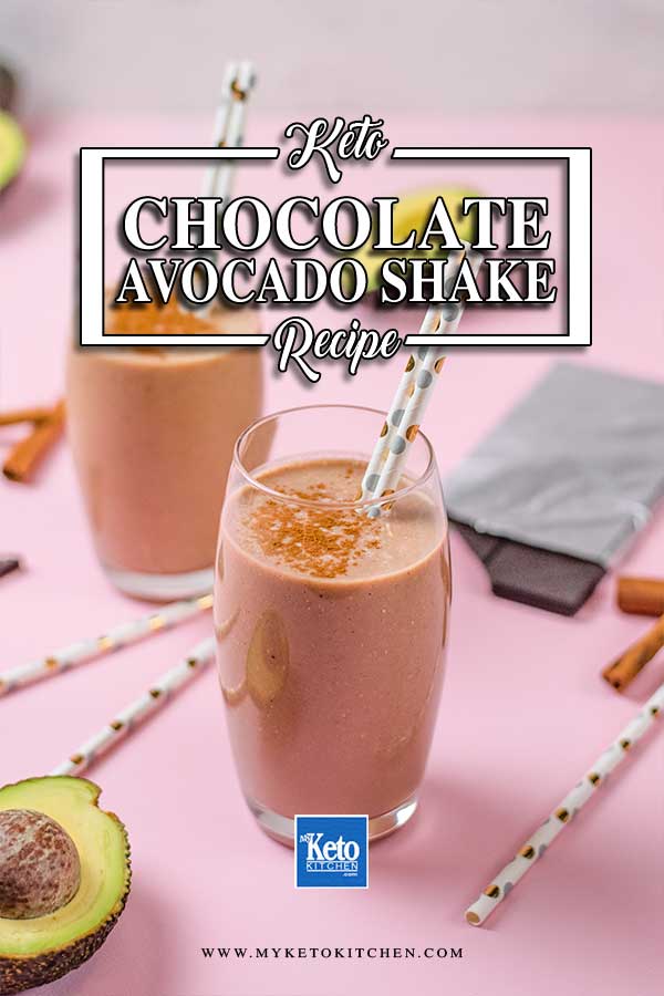 Keto Chocolate Avocado Smoothie in a glass on a pink table