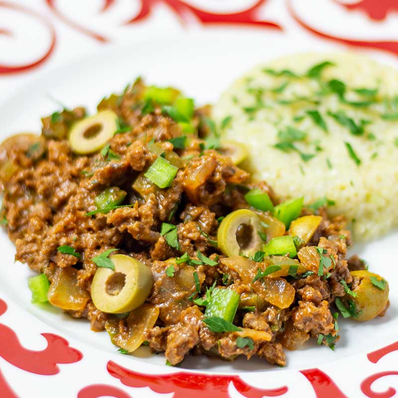 Keto Cuban Picadillo on a plate with cauliflower rice
