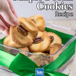 Keto Maple Pecan Cookies in a clear square container with a green ribbon