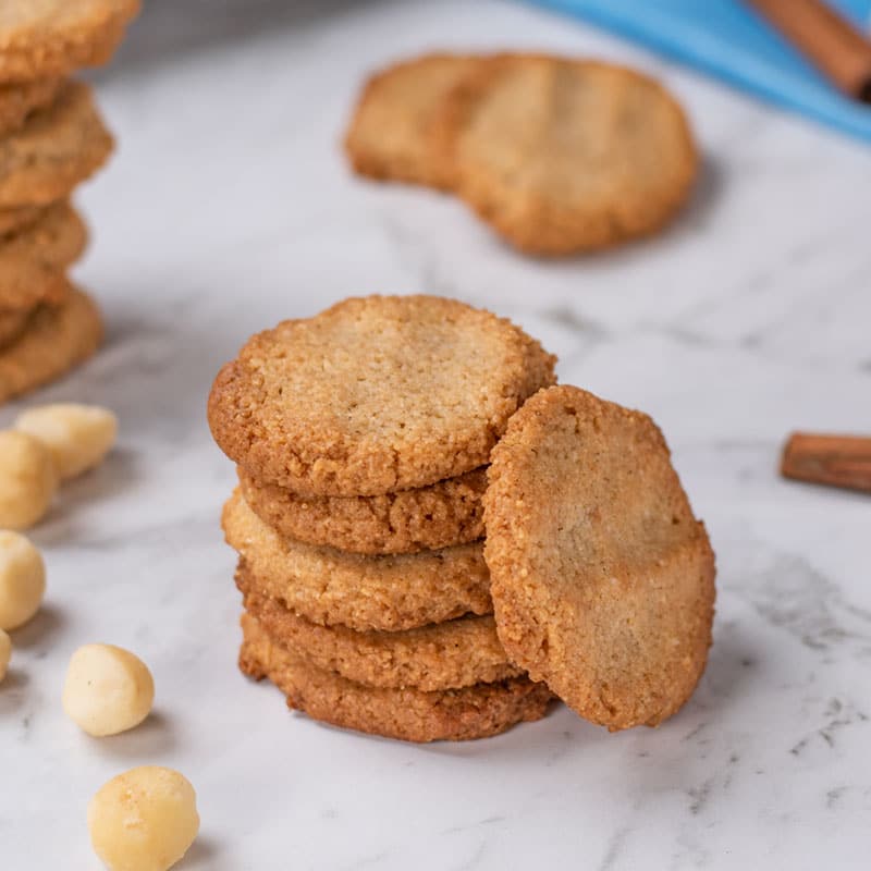 Keto Macadamia Cookies stacked in a pile