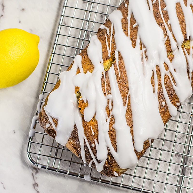 Keto Lemon Poppyseed Loaf on a cooling rack