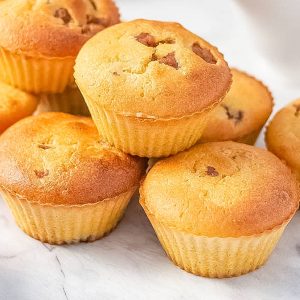 Keto pancake muffins on a white plate.