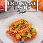 Imago shows two keto breakfast tacos on a white plate. The tacos are filled with bacon, scrambled eggs, avocado and chives.