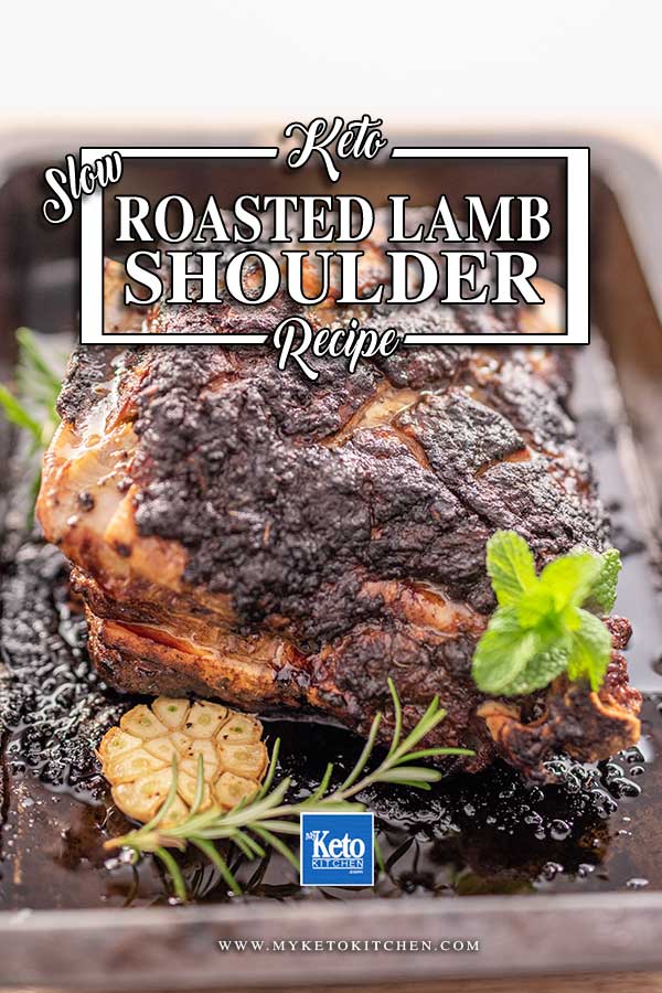 Image show a cooked lamb shoulder in a roasting pan with fresh rosemary, and mint