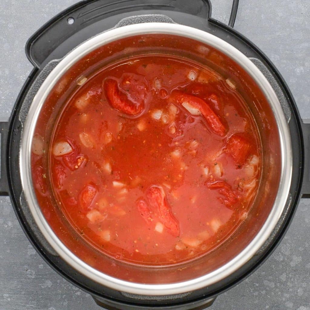 Keto Creamy Tomato Soup Ingredients simmering in an instant pot