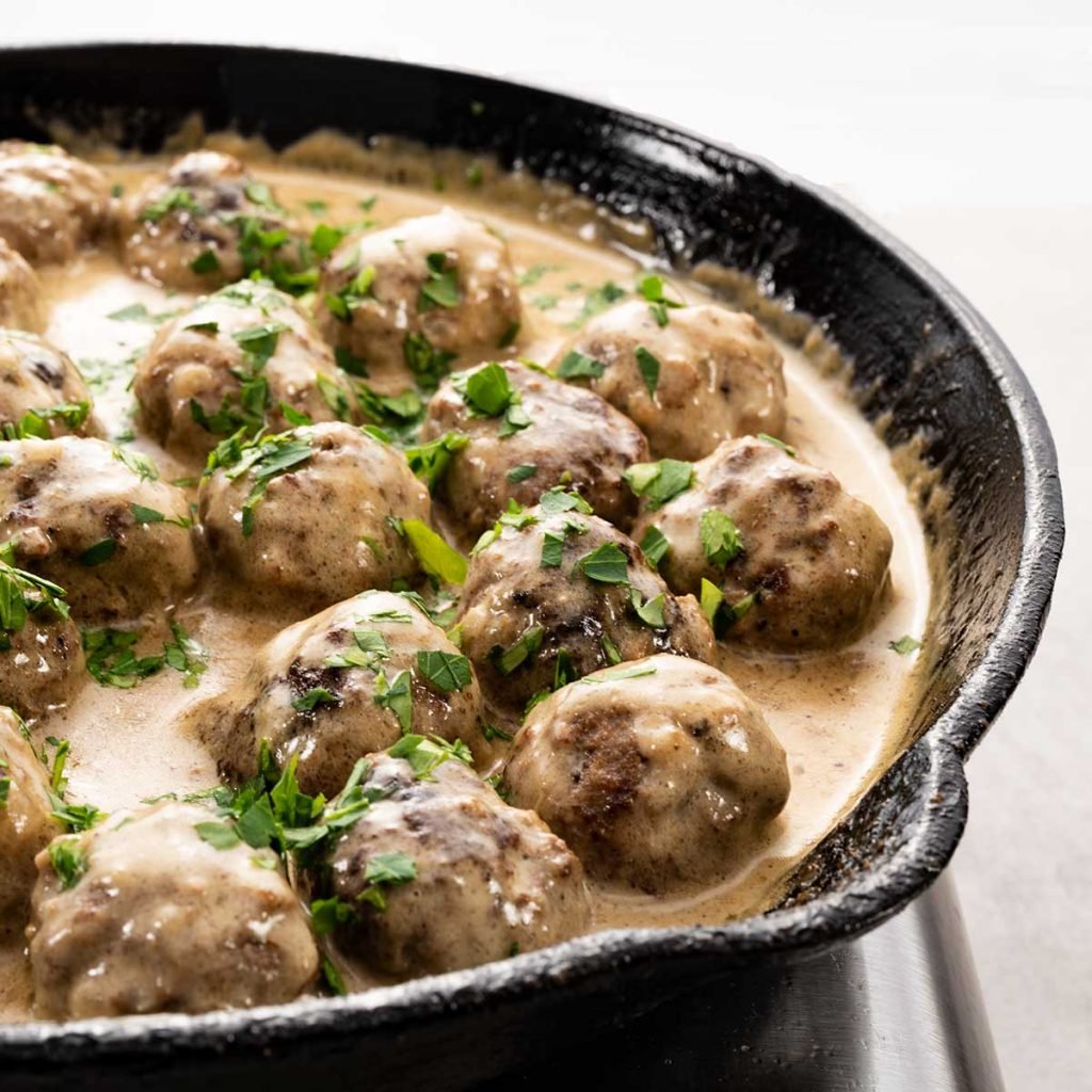 Keto Swedish Meatballs in a cast iron skillet