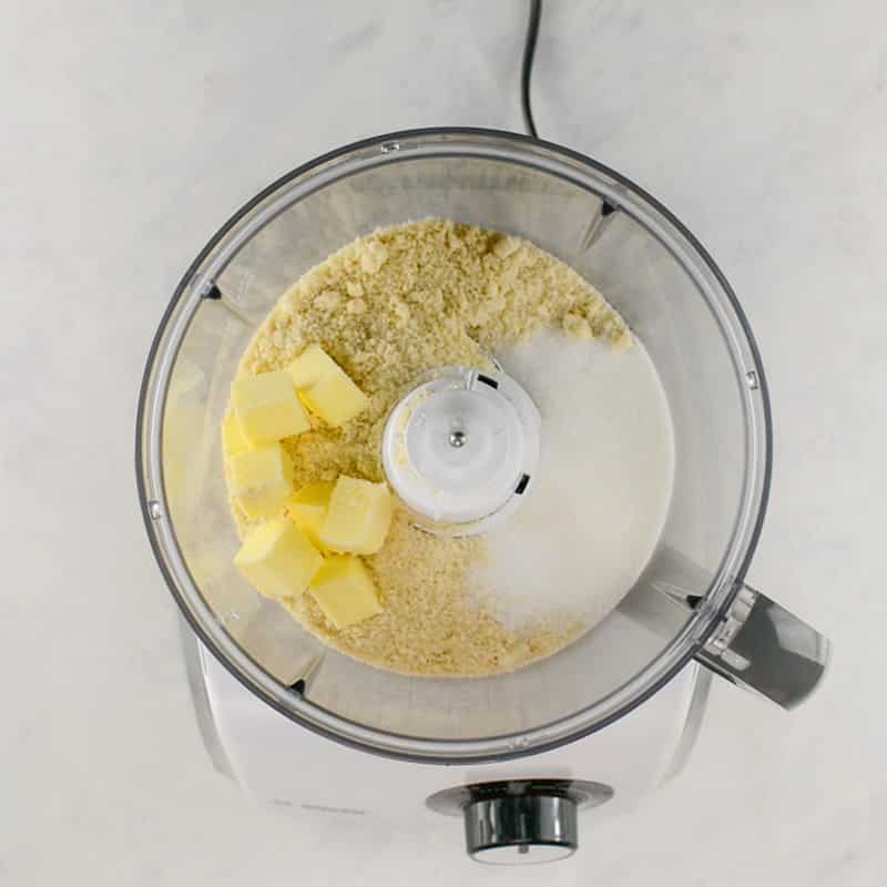 Keto Lemon Bars crust ingredients in a food processor