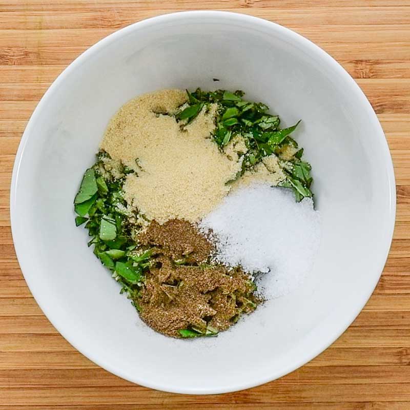 Herb marinade ingredients for Grilled Tri tip in a white bowl