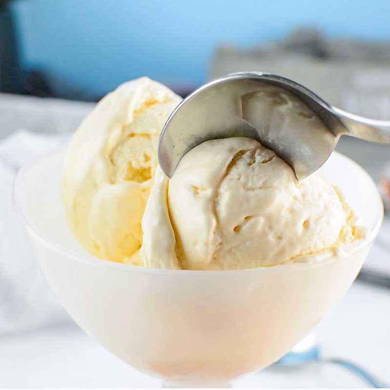 No Churn Keto Vanilla Ice Cream being spooned out of a bowl