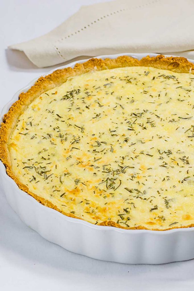 Keto Three Cheese Pie in a quiche dish