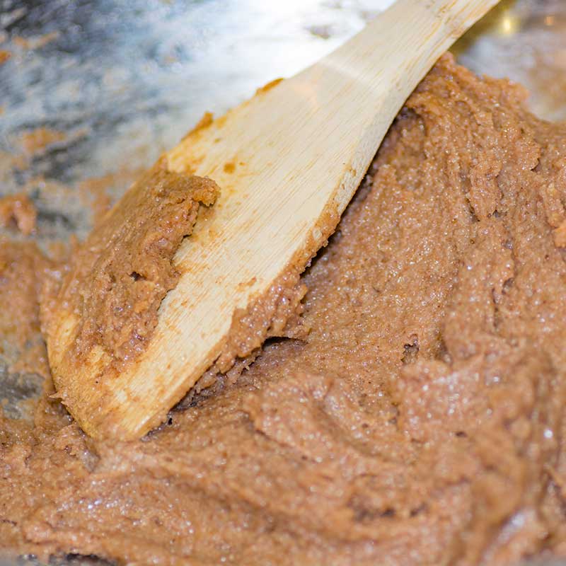 Keto Cinnamon Walnut Butter Cookie dough in a mixing bowl