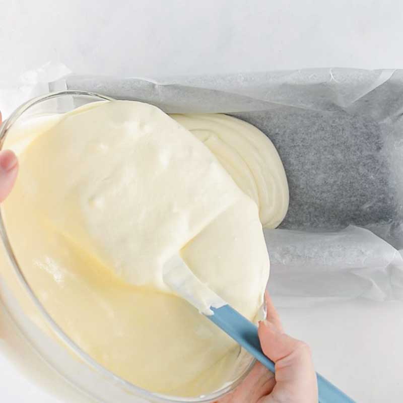 No-Churn Keto Vanilla Ice Cream mixture being poured into a pan