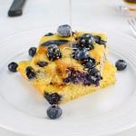 Keto Sheet Pan Pancakes with blueberries on a white plate