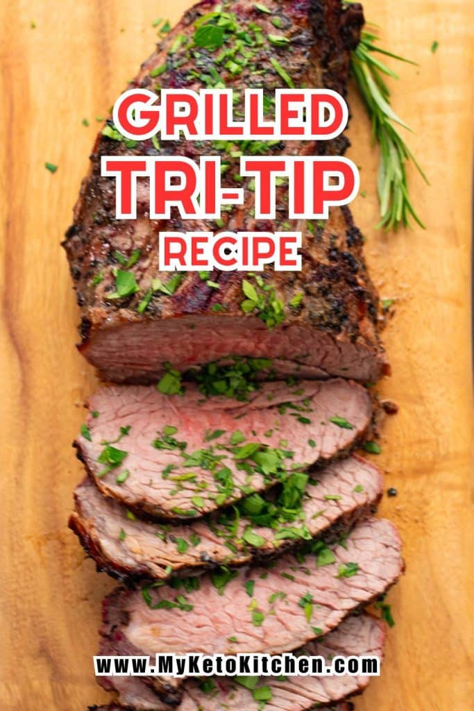 Grilled tri tip sliced on a chopping board.