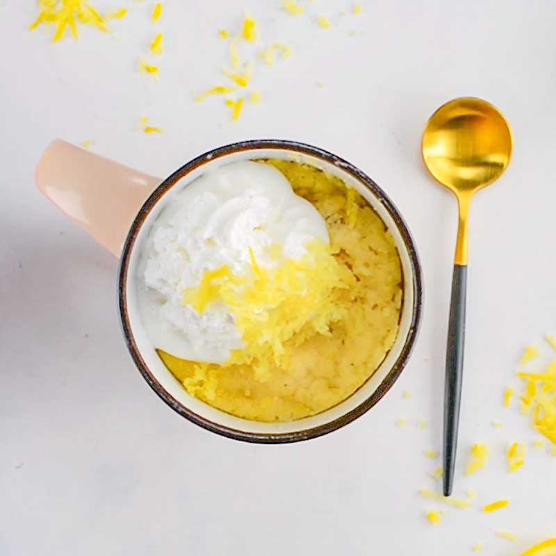 Keto Lemon Mug Cake in a pink mug