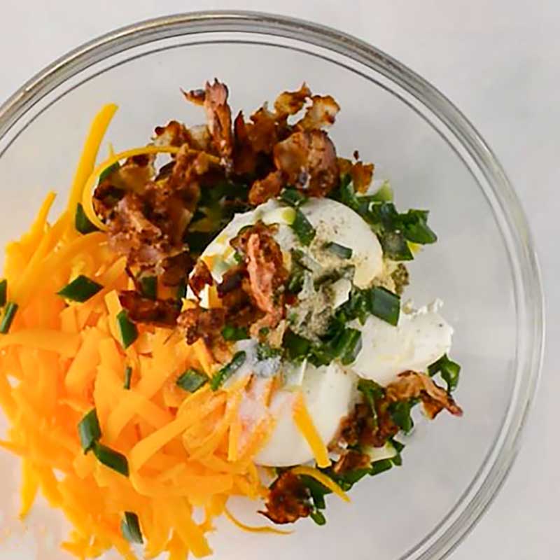 Keto Jalapeno Poppers filling ingredients in a bowl