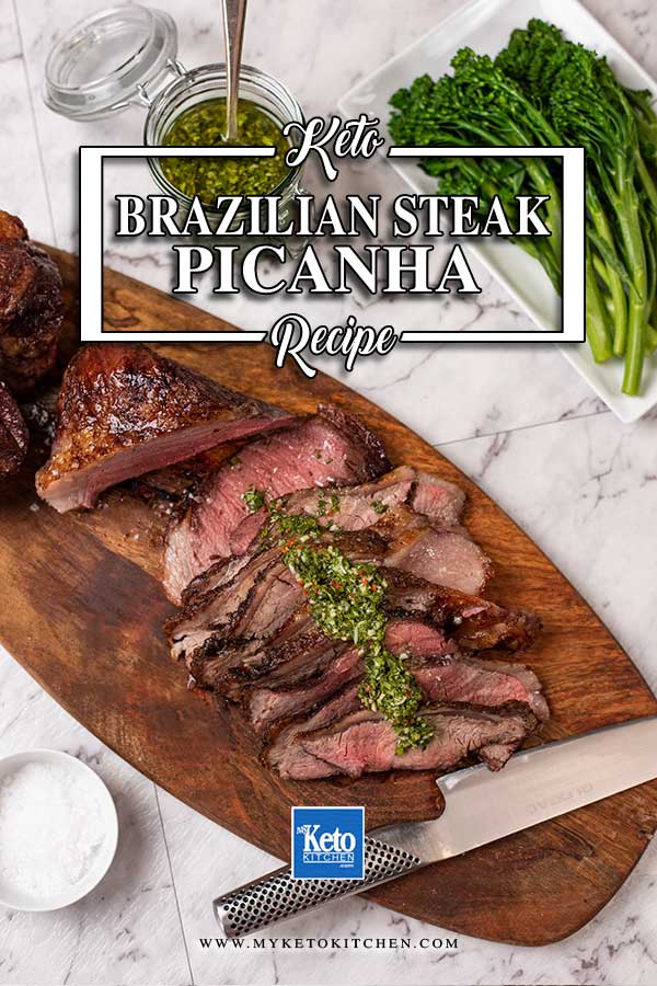 Brazilian Steak Picanha on a wooden board with keto chimichurri sauce