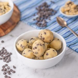 Keto Cookie Dough rolled into balls in a bowl