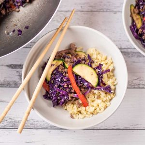 Keto Beef and Vegetable Stir Fry with cauliflower rice in a bowl