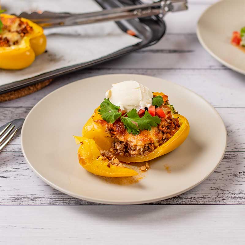 Keto Mexican Pepper cut open to show the inside on a plate