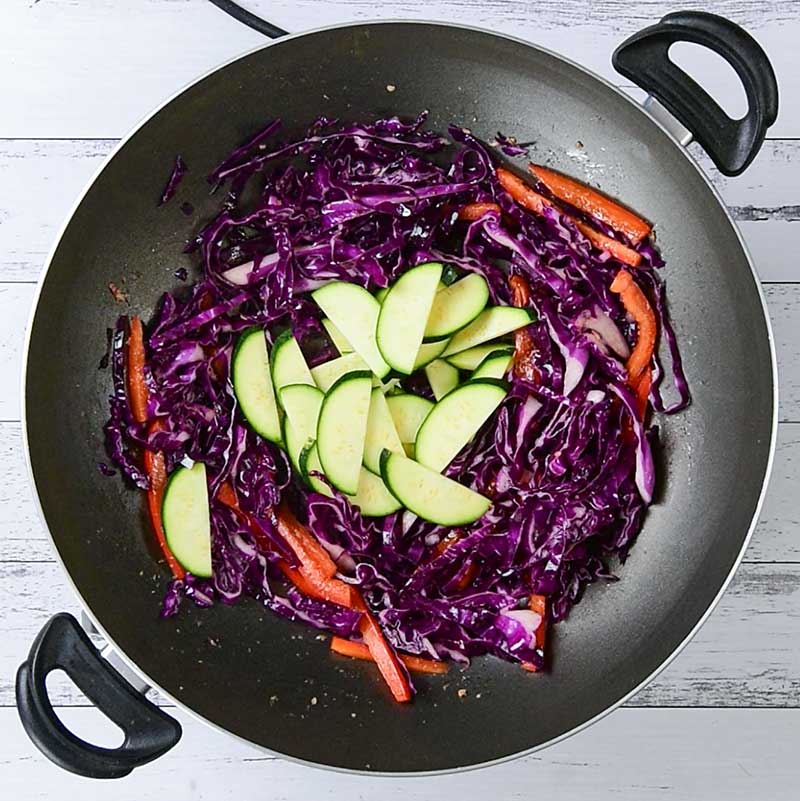 Keto Beef and Vegetable Stir Fry Ingredients cooking in a wok