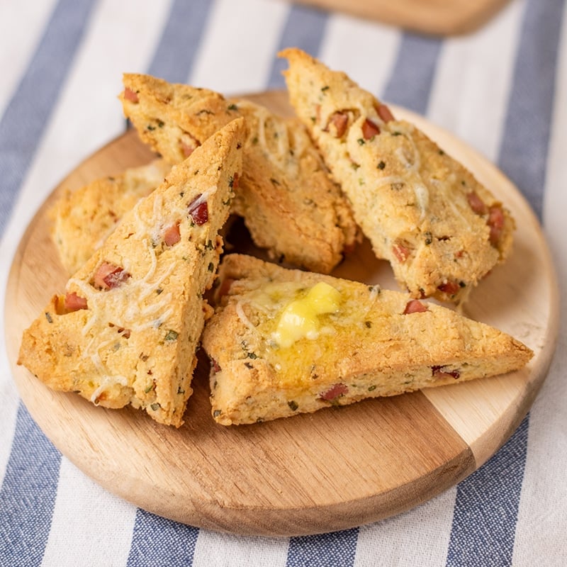 Keto Ham and Cheddar Scones on a wood platter