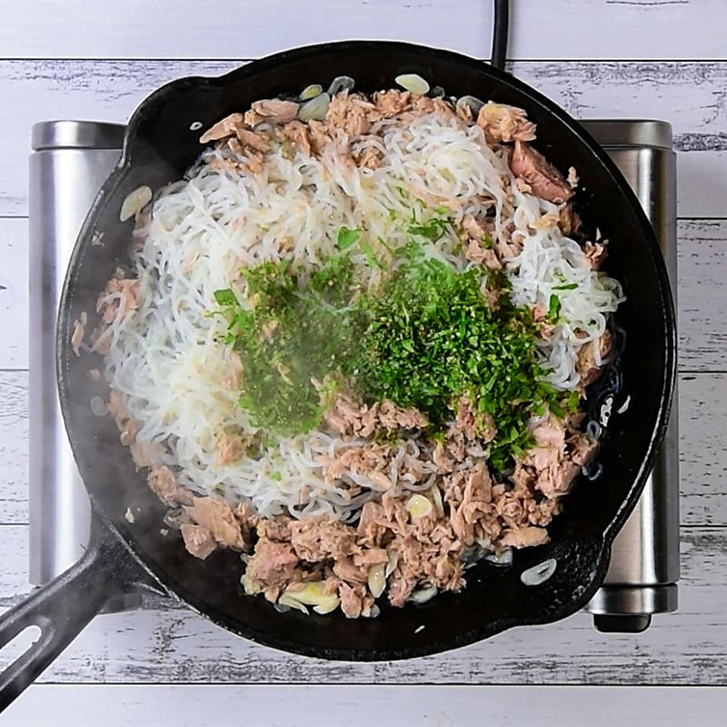 Keto Tuna Spaghetti Ingredients cooking in a cast iron skillet