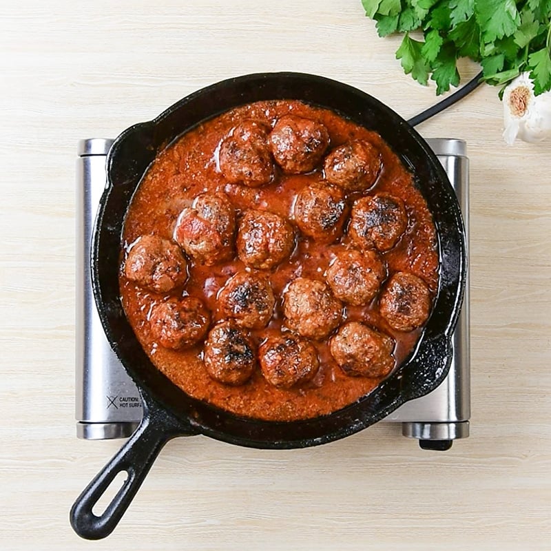 Keto Meatball Subs Ingredients - meatballs simmering in keto marinara sauce