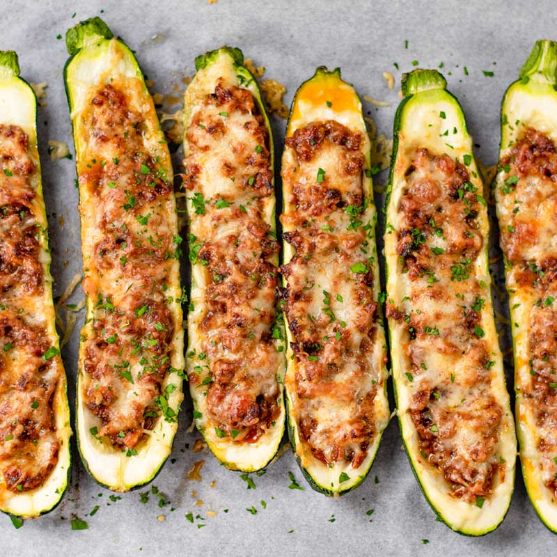 Cooked Keto Zucchini Boats on a cookie sheet