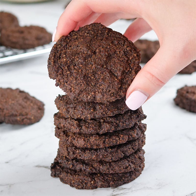 Keto Chocolate Cookies stacked on top of each other.