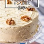 Keto Walnut Cake on a glass cake stand.