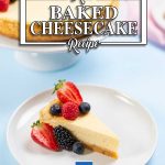 A slice of Keto Baked Vanilla Cheesecake topped with berries on a plate.