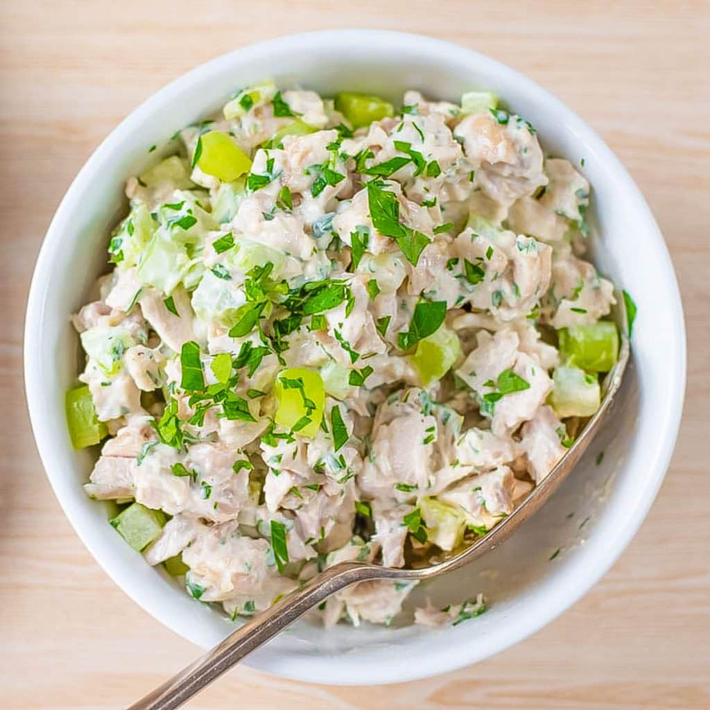 Keto chicken salad in a white bowl.