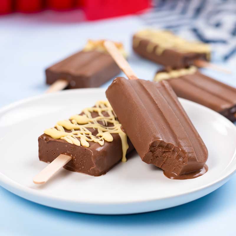 Keto Chocolate Ice Cream Bars on a white plate.