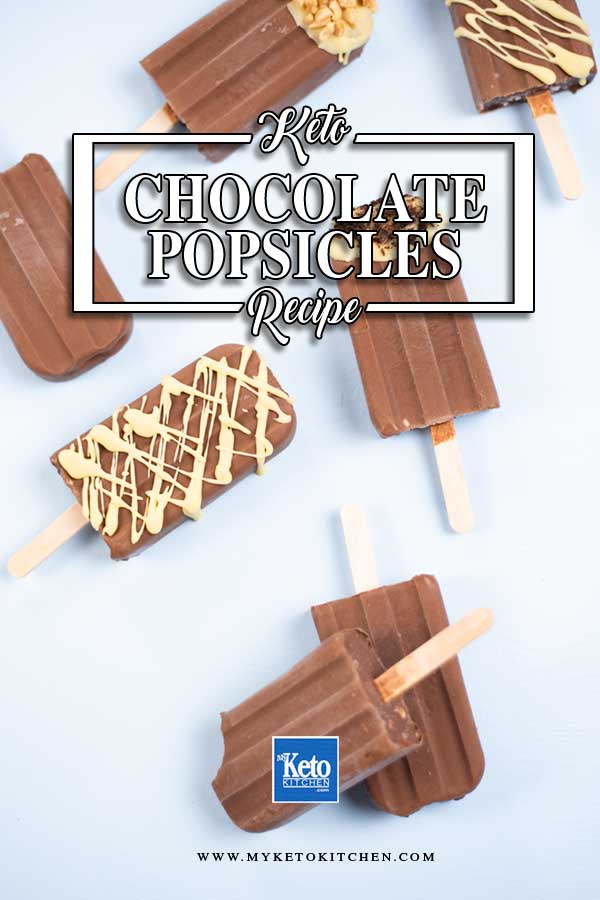 Keto Chocolate Popsicles on a blue table.