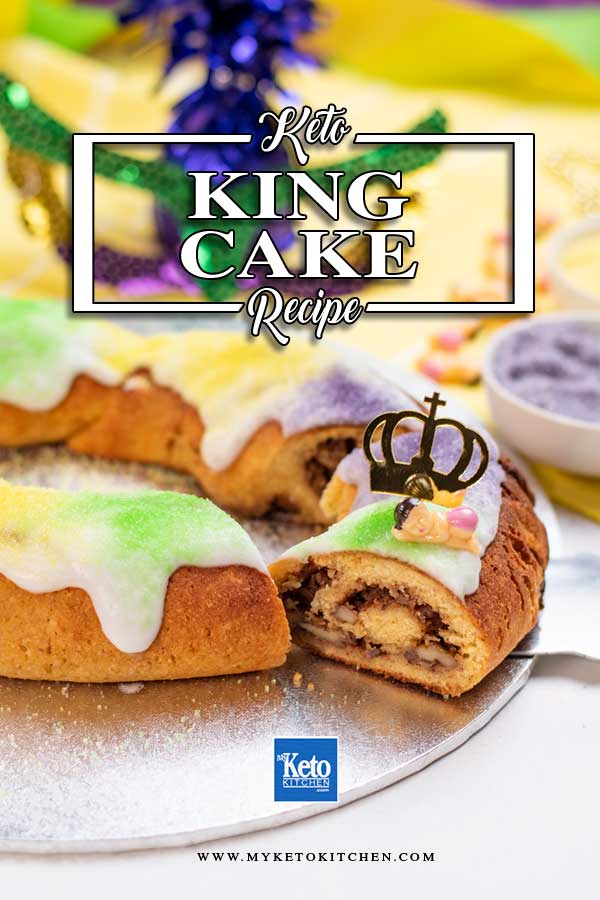 Keto King Cake with a slice cut out to show the center cinnamon pecan swirl.