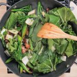 Keto Pork Belly Stir Fry Ingredients being cooked in a wok.