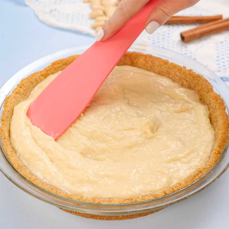 Keto Sugar Cream Pie crust being filled.