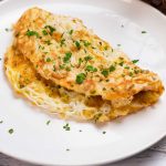 Low Carb Chicken Noodle Omelette on a white plate.