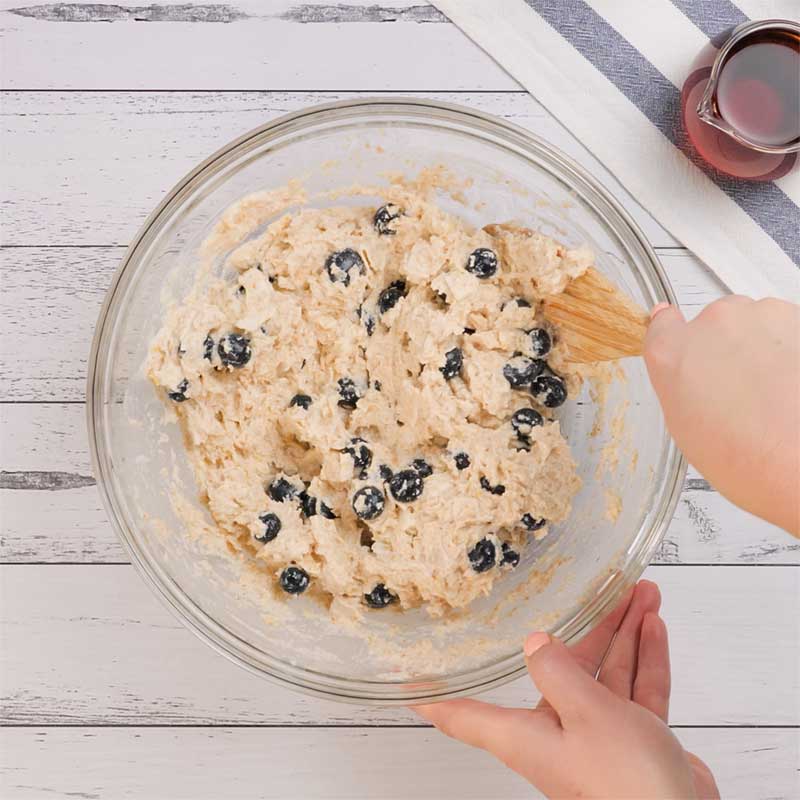 Keto Blueberry Baked Oatmeal Ingredients being mixed in a bowl