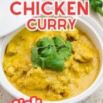 Keto chicken curry in a bowl with text saying, "keto chicken curry."