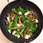 Pork belly stir fry in a wok.