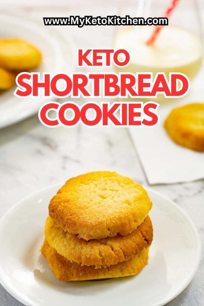 Three keto shortbread cookies stacked on top of one another.